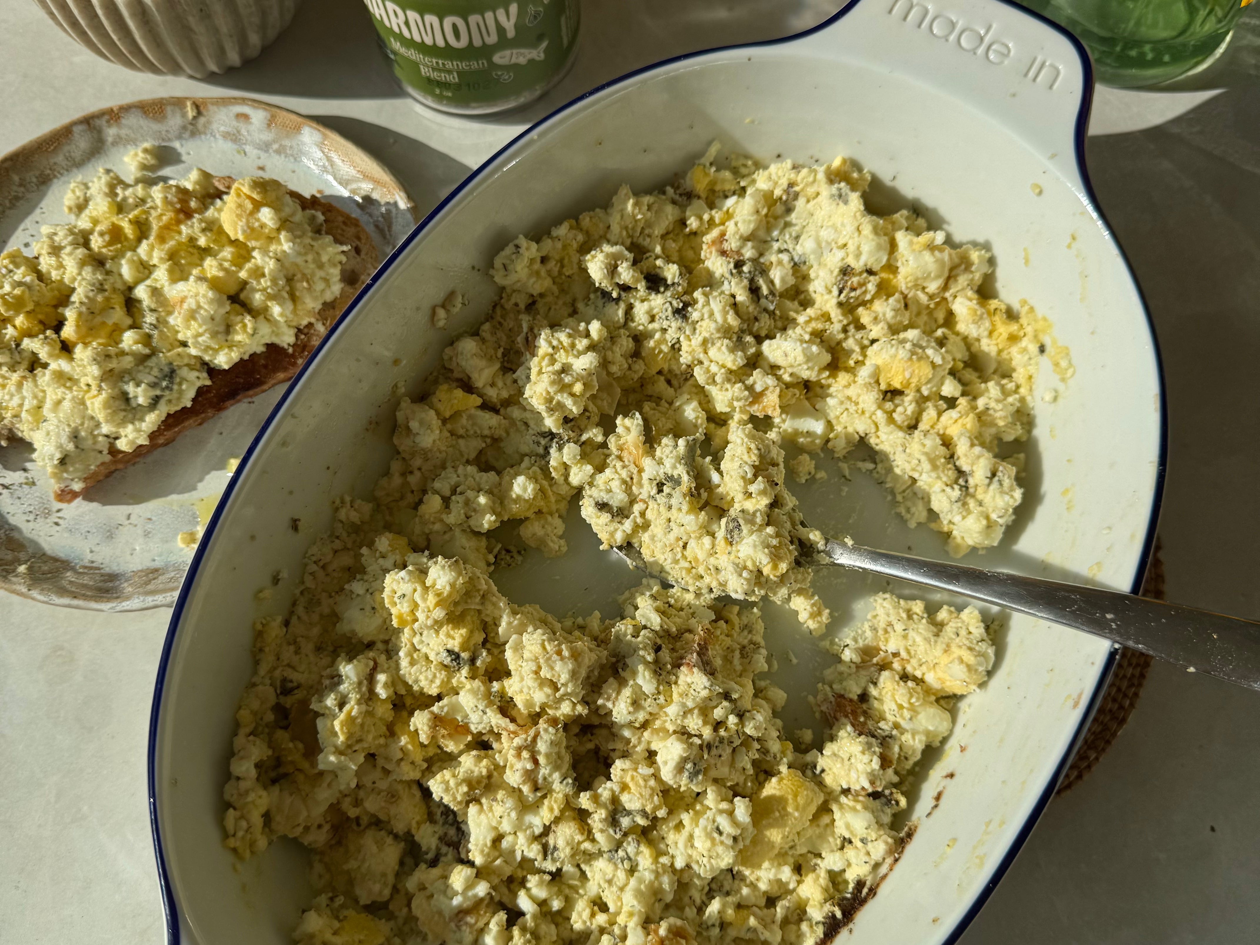 Mediterranean Baked Feta Eggs in a roasting pan