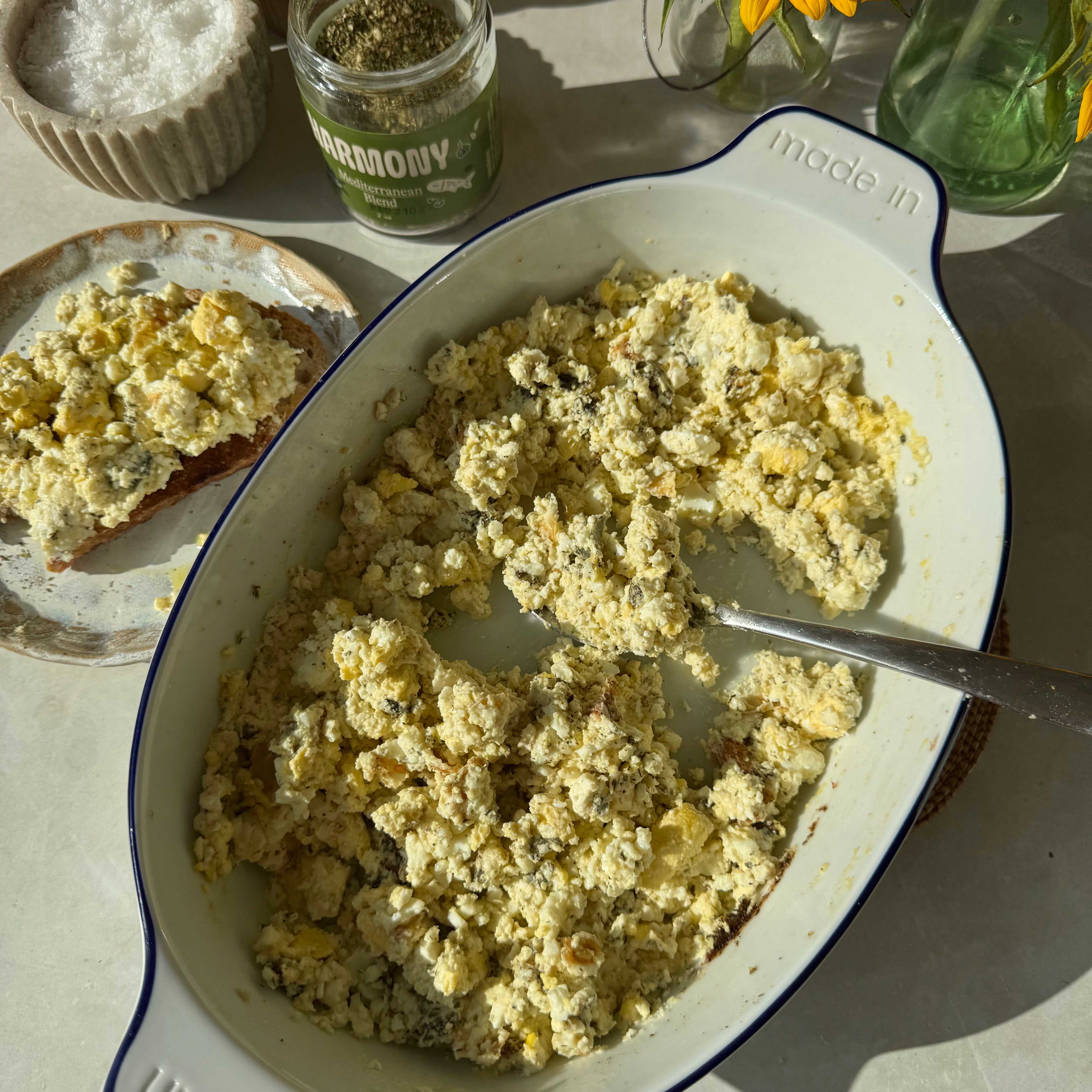 Mediterranean Baked Feta Eggs in a roasting pan